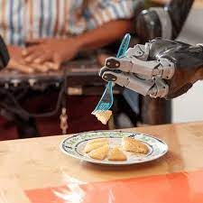 Robotic Arms Allow Partially Paralyzed Man To Feed Himself Cake For First Time In 30 Years